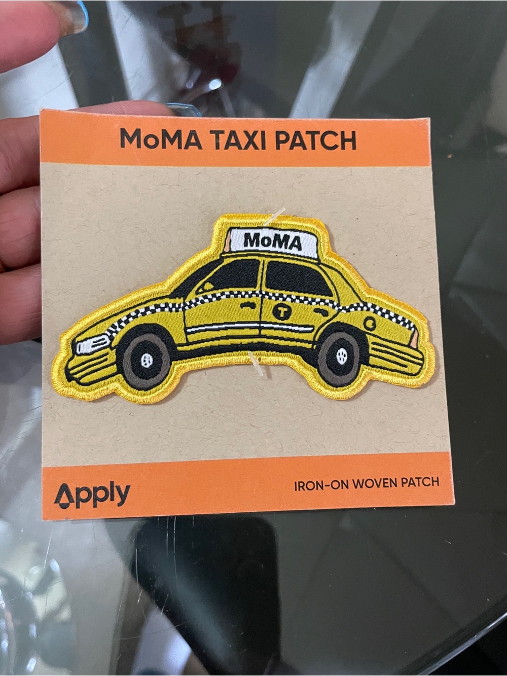 MoMA Beige Cardboard Backing with Orange Logo Patch (unisex)